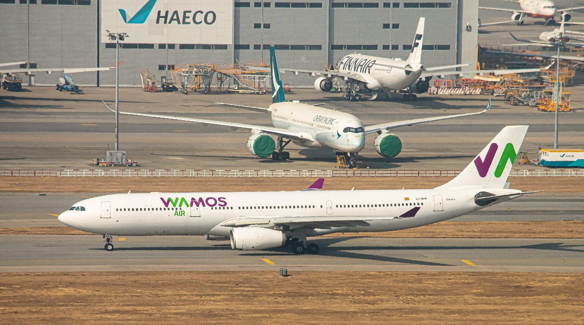 WaMos A333 EC-NHM @ HKG (1 - 1).JPG